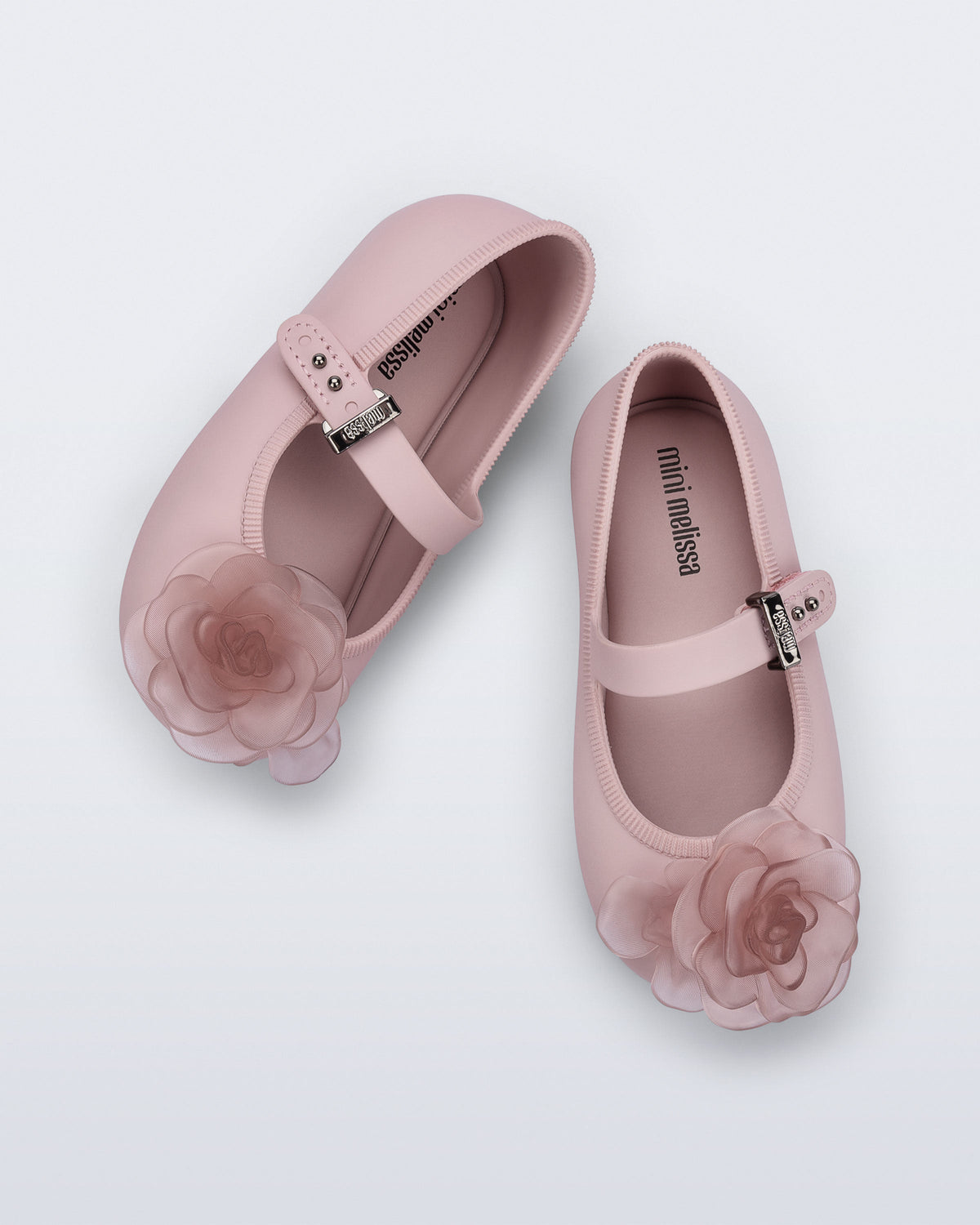 Top view of a pair of pink Soft Ballerina baby flats with pink flowers
