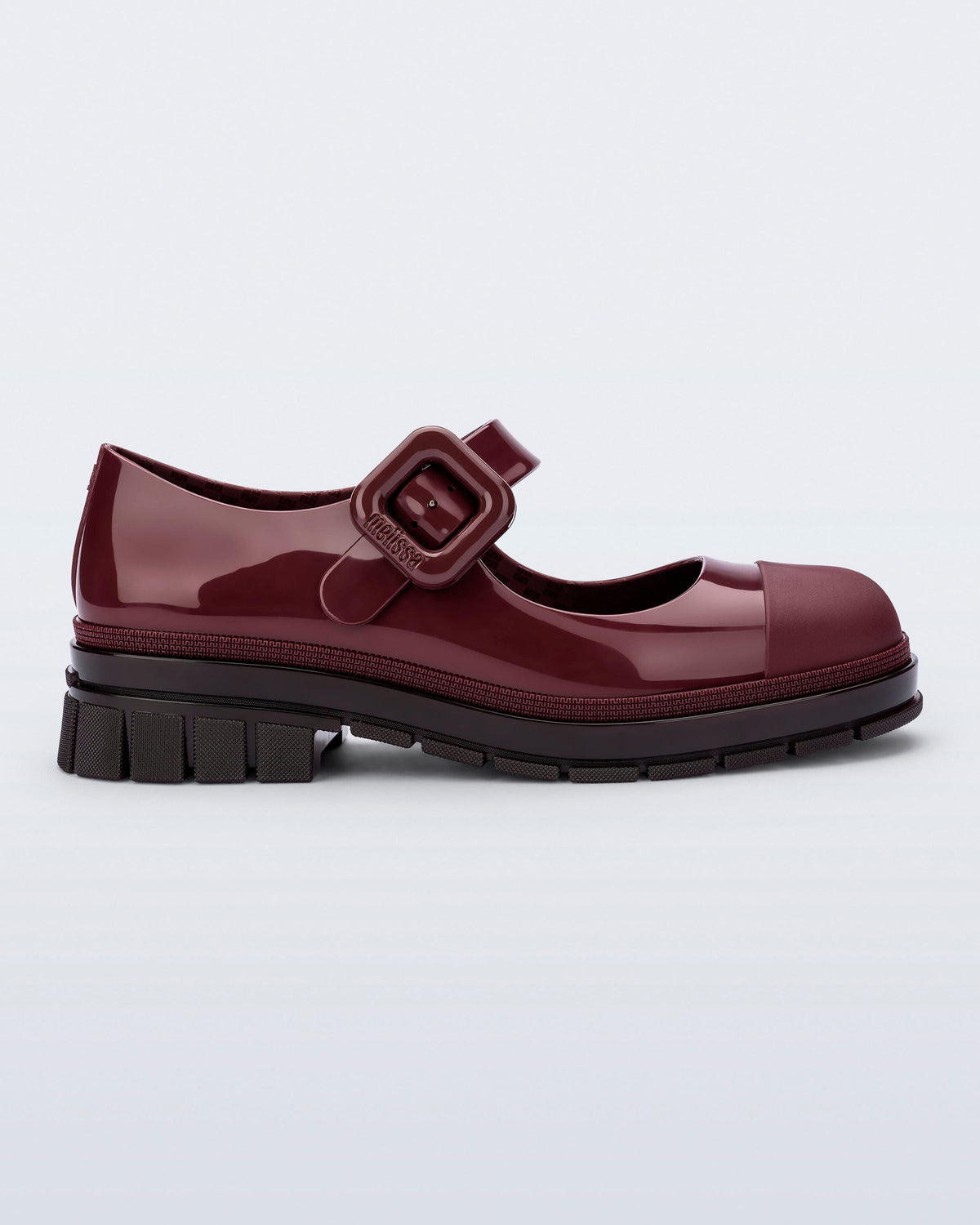 Side view of a burgundy June mary jane with matte toe cap