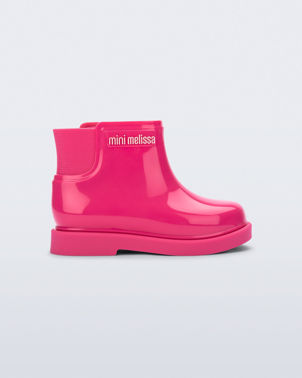 Side view of a pink Chelsea II baby boot