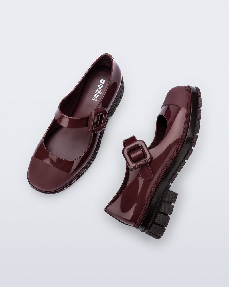 Top and side view of a pair of burgundy June mary janes with matte toe cap