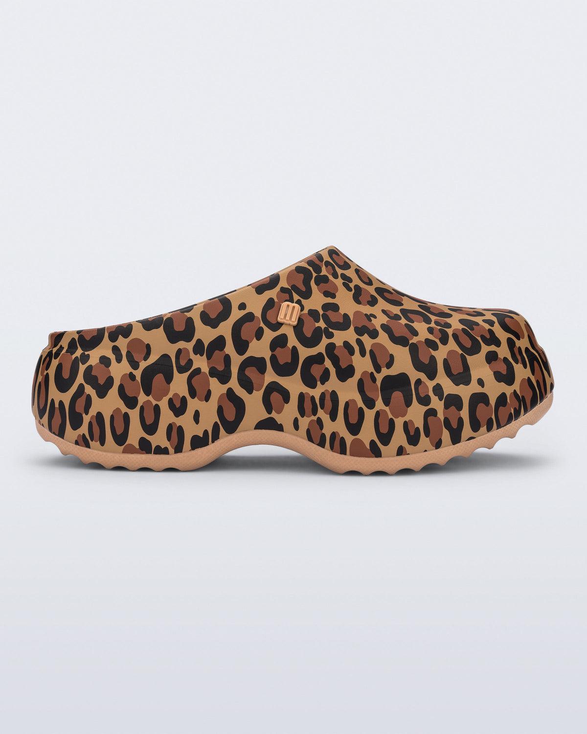 Side view of a beige/black leopard print Free Clog Print Platform.