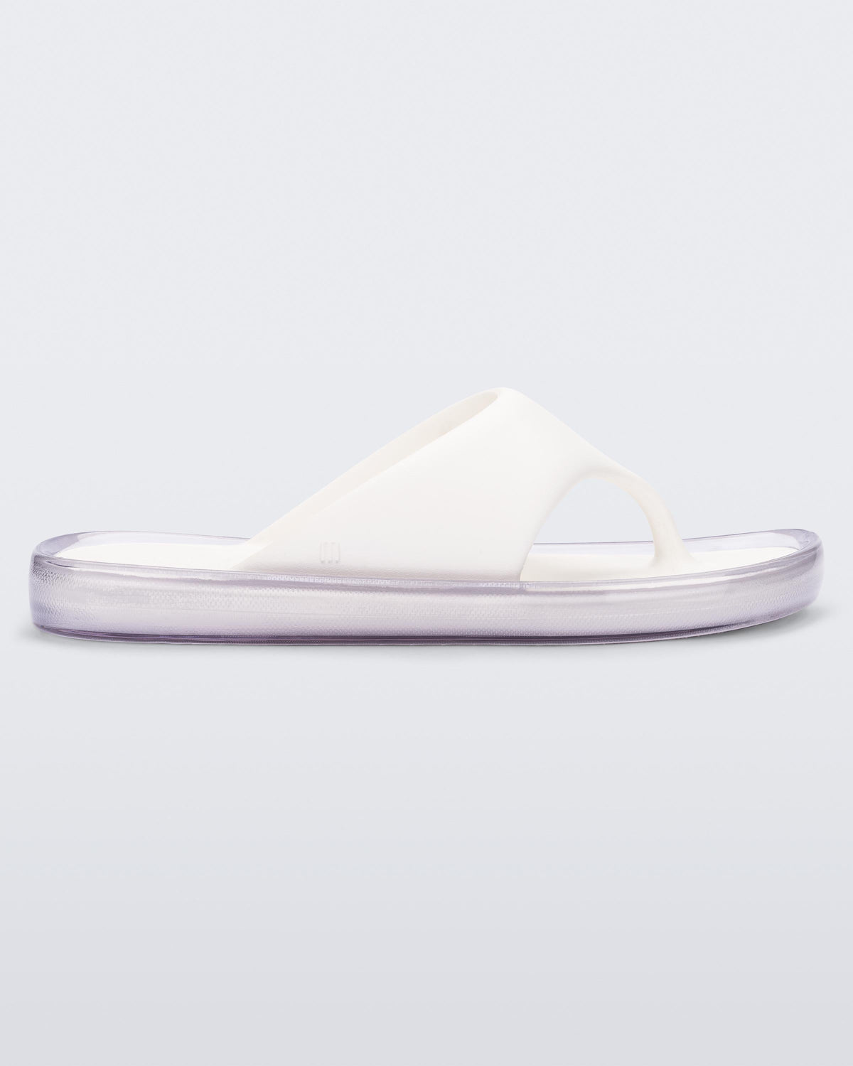 Side view of a white with clear sole Float flip flop