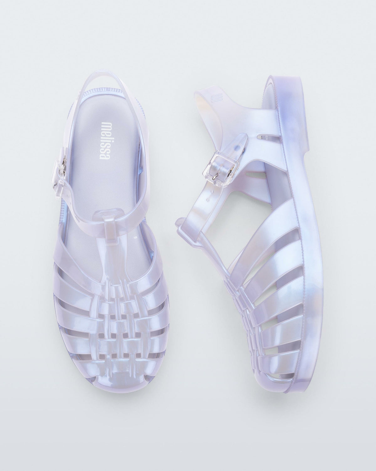A top and side view of a pair of pearly blue Melissa Possession sandals with a fisherman sandal design