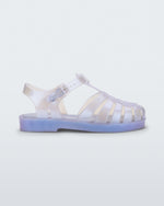 Side view of a pearly blue Mini Melissa Possession sandal with a fisherman sandal design