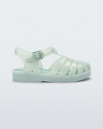Side view of a light green baby Possession sandal