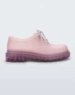 Side view of a matte lilac Melissa Bass sneaker, with a light matte lilac base, lilac laces and a darker transparent lilac sole.