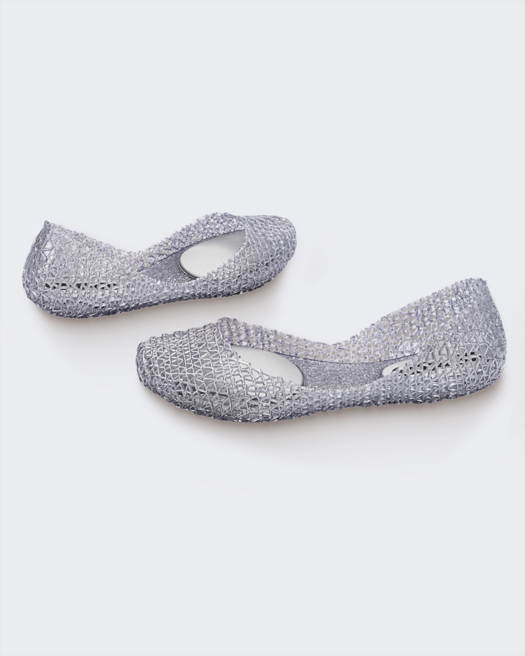 Outside and Inside view of a pair of Melissa Campana flats in clear