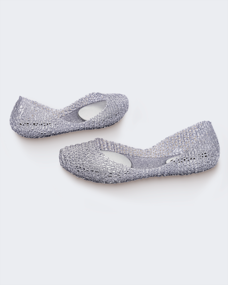 Outside and Inside view of a pair of Melissa Campana flats in clear