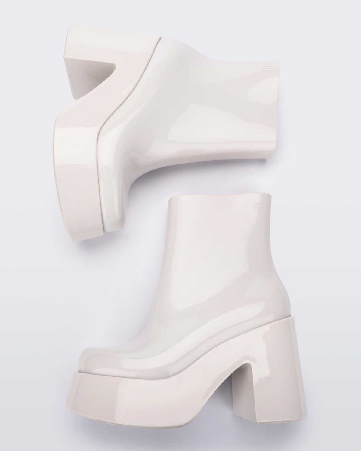 Top view of a pair of white Melissa Nubia platform heel boots.