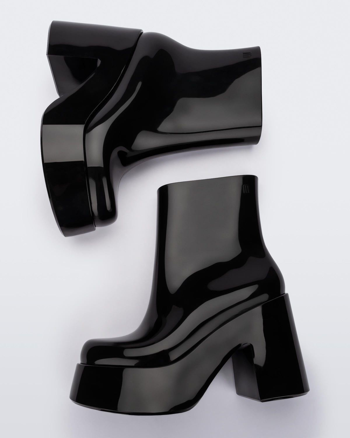 Top view of a pair of black Melissa Nubia platform heel boots.