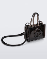 Angled view of a black small Melissa Jelly Shopper bag + Telfar bag with a handle and straps.