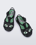 Top view of a pair of black baby Possession Cat sandals