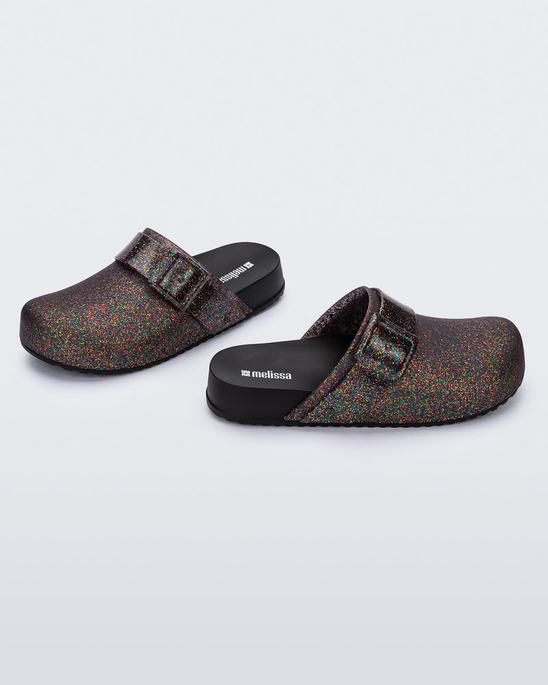 Side and angled view of a mixed glitter/black Cozy Clog