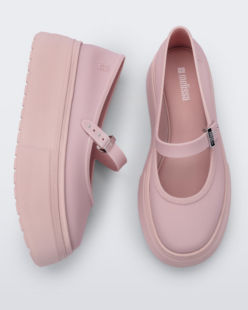 Top and side view of a pair of pink Soft Ballerina Platform flats