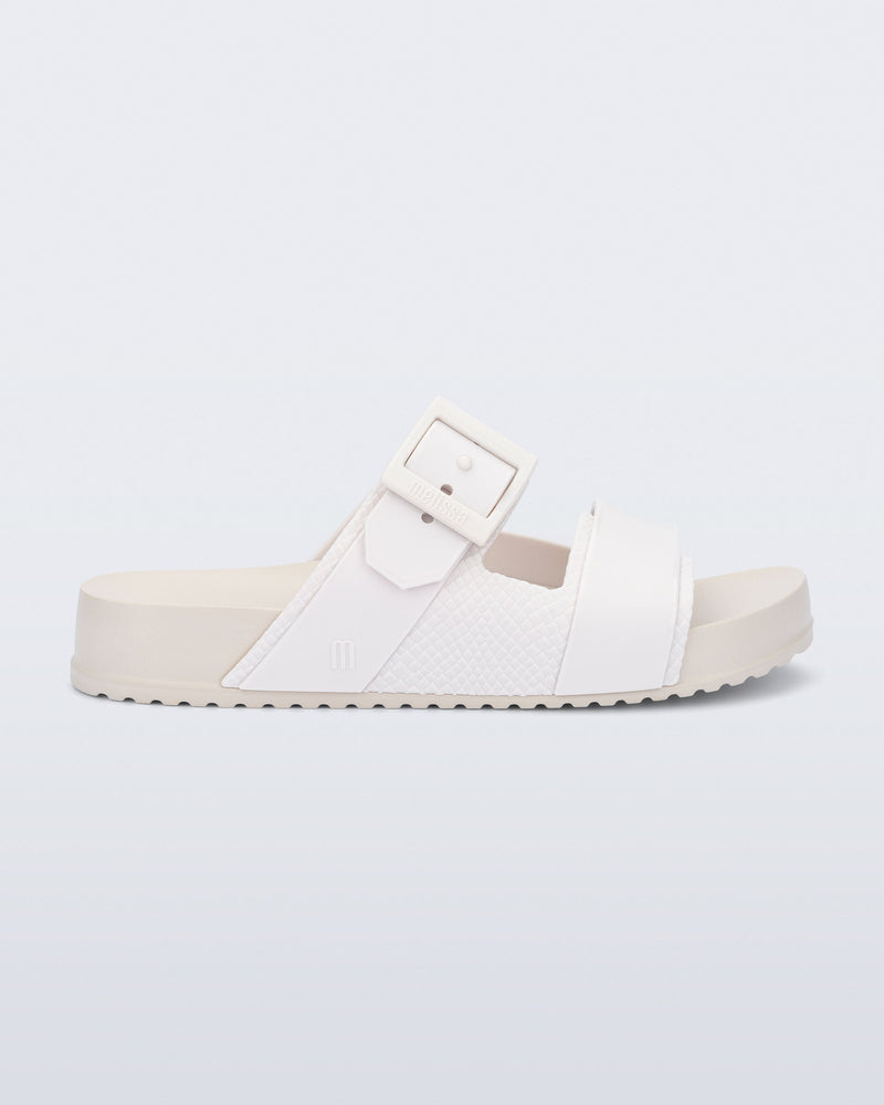 Side view of a white Cozy Connection slide