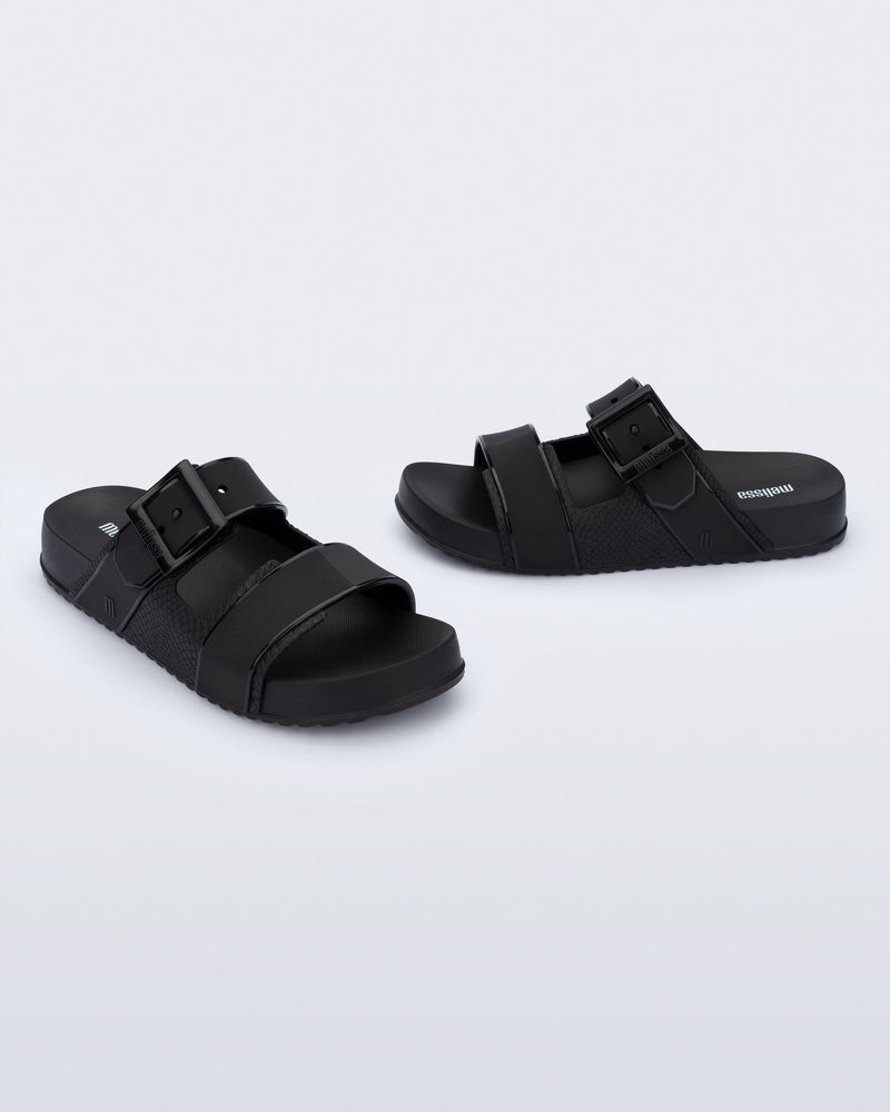 Angled view of a pair of black Cozy Connection slides