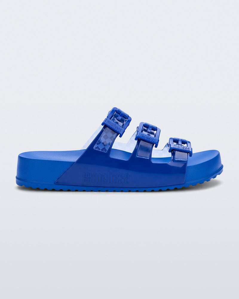 Side view of a blue Cozy Stripe slide