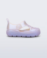 Side view of a pearly blue Bowie baby sandal.
