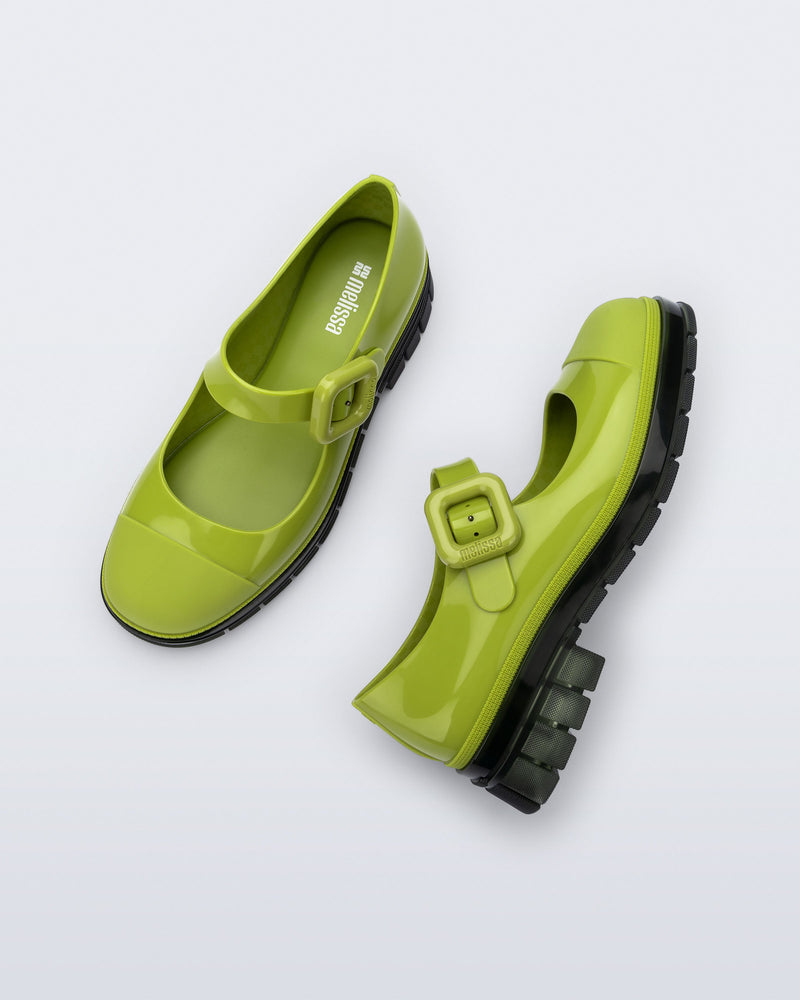 Top and side view of a pair of green with black sole June mary janes with matte toe cap