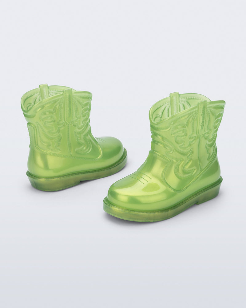 Back and side view of a pair of pearly green Texas baby boots
