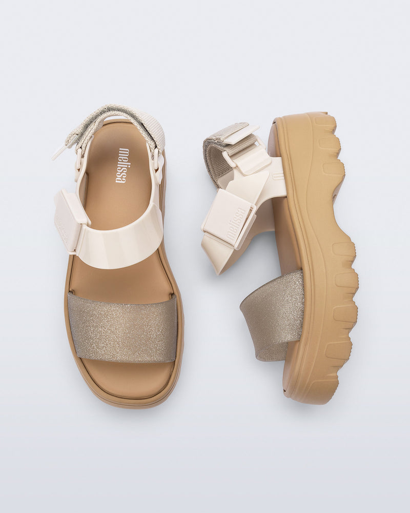 Top and side view of a pair of beige/glitter Kick Off Sandals