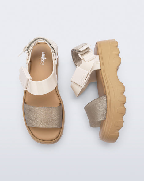 Top and side view of a pair of beige/glitter Kick Off Sandals