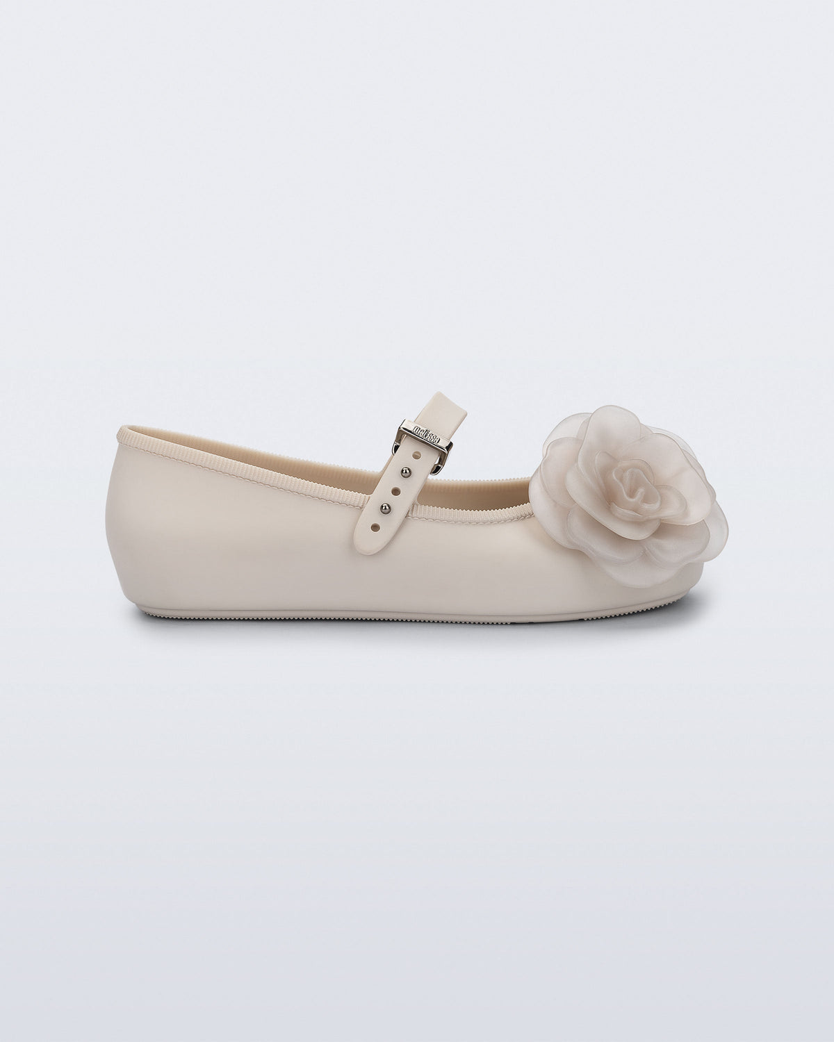 Side view of a beige Soft Ballerina Petals kids flat with flowers