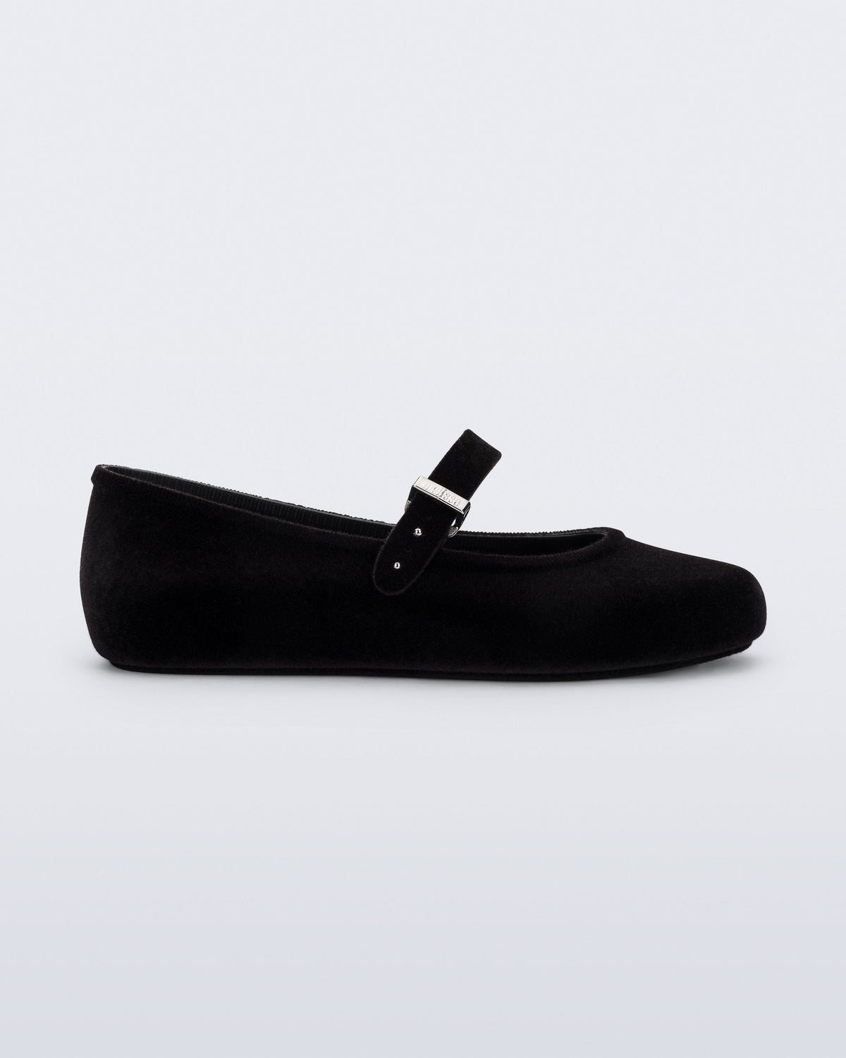 Side view of a black Soft Ballerina Velvet II flat