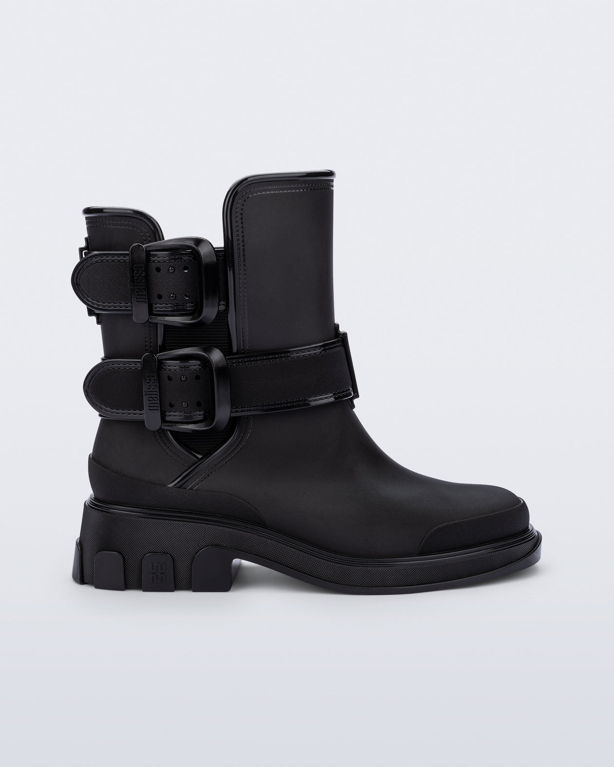 Side view of a black Bang Boot with two side buckles