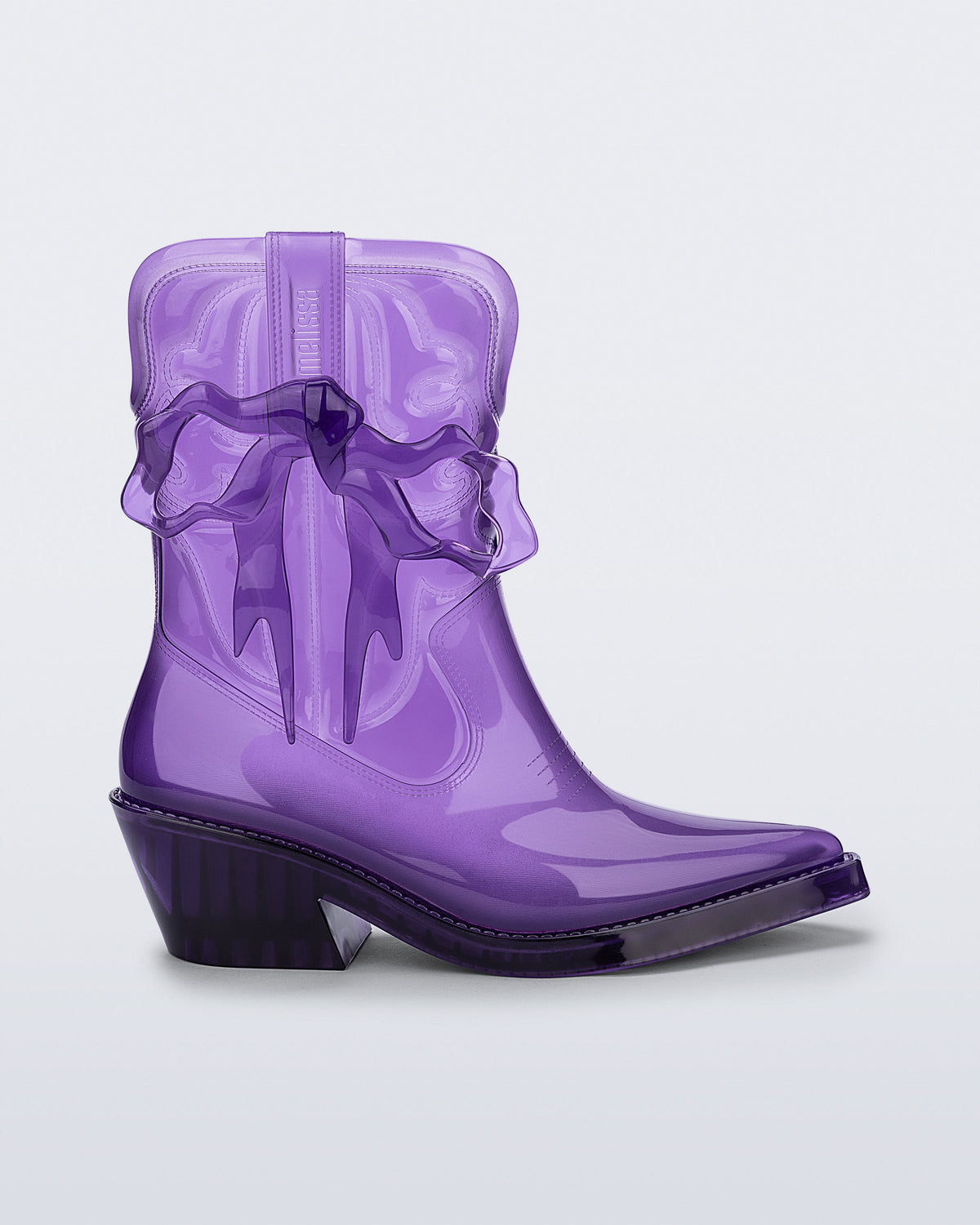 Side view of a transparent purple Texas + Maldito boot