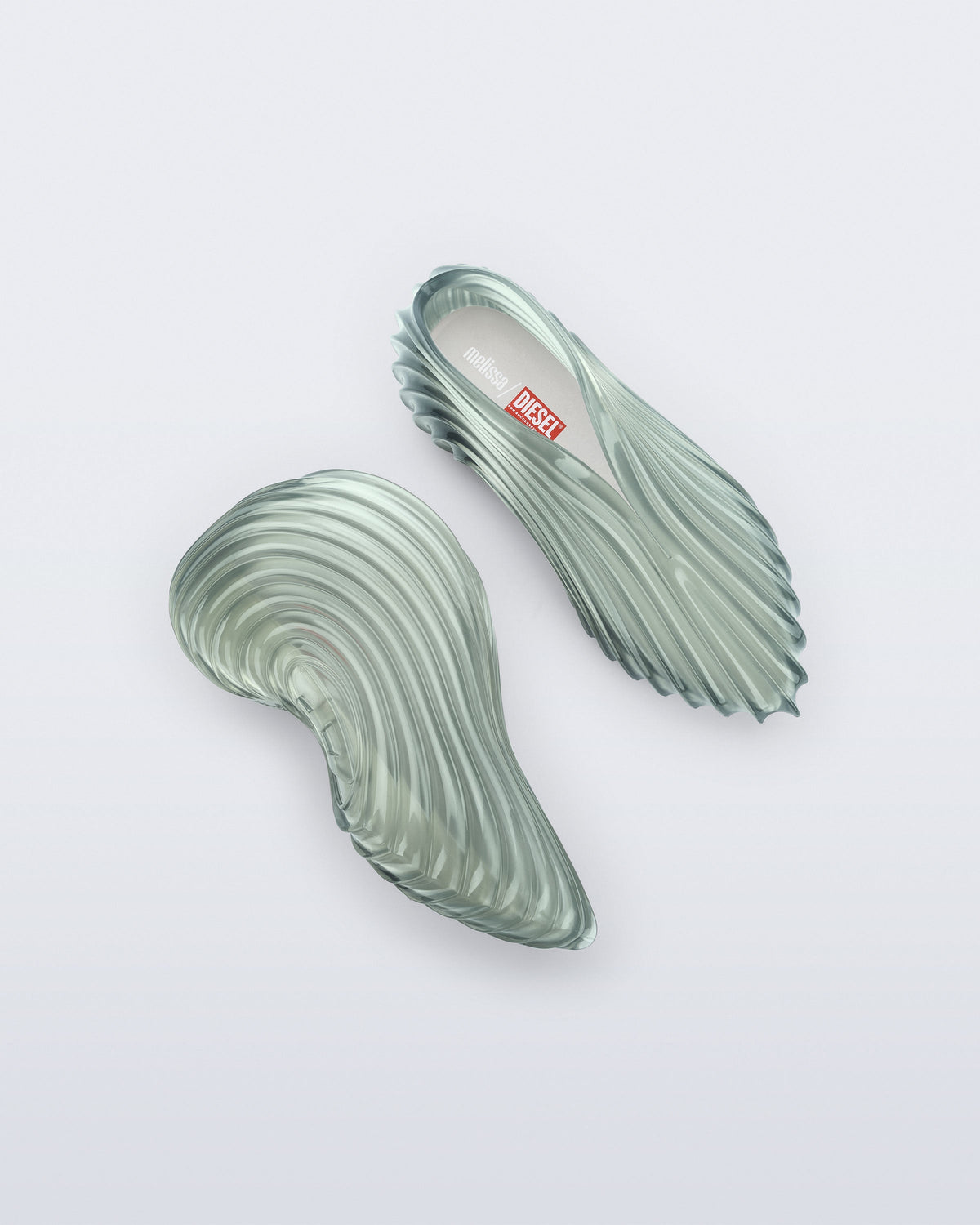 Top and side view of a transparent green Sneaker + Diesel
