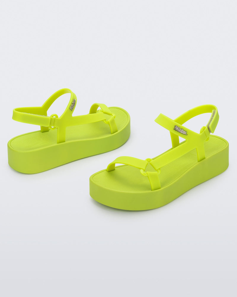 Angled view of a pair of green Sun Downtown Platform sandals