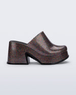 Side view of a mixed glitter Mia mule with black sole