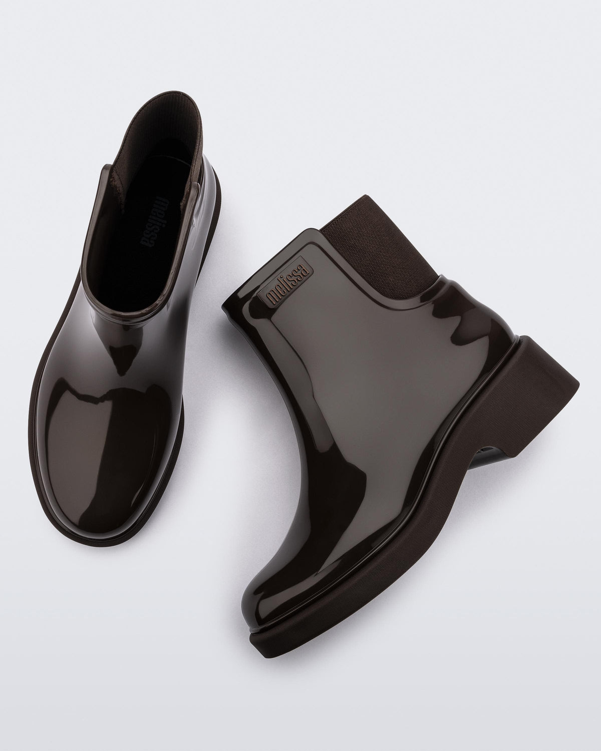 top and side view of a pair of dark brown Chelsea boots