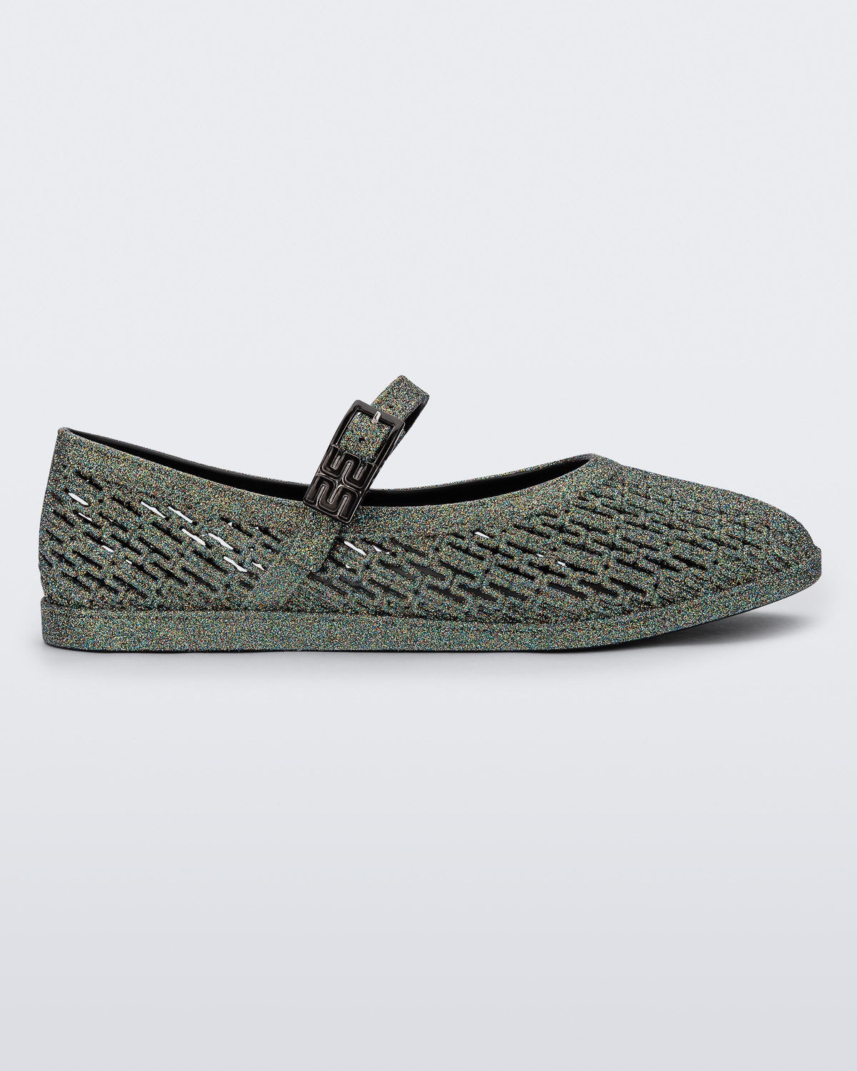 Side view of a dark silver glitter Harper flat with strap