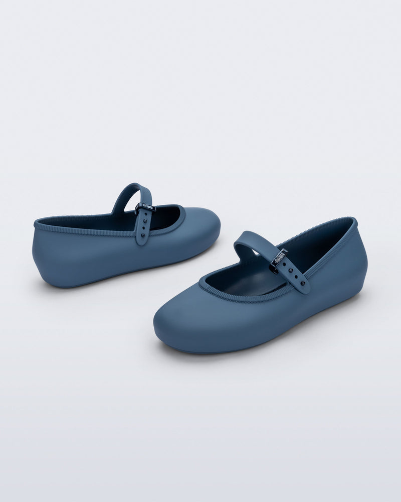 Back and side angled view of a pair of blue Soft Ballerina kids flat with strap