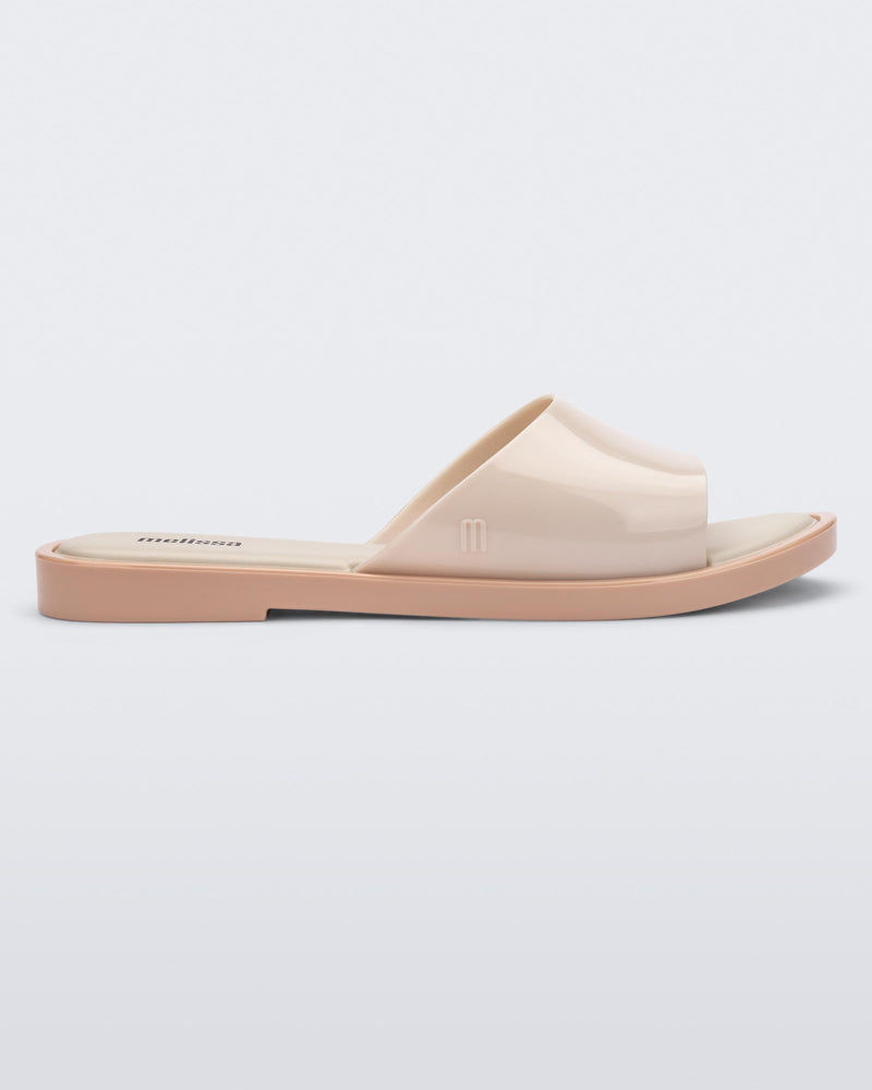 Side view of a beige tortoiseshell Melissa Miranda slide