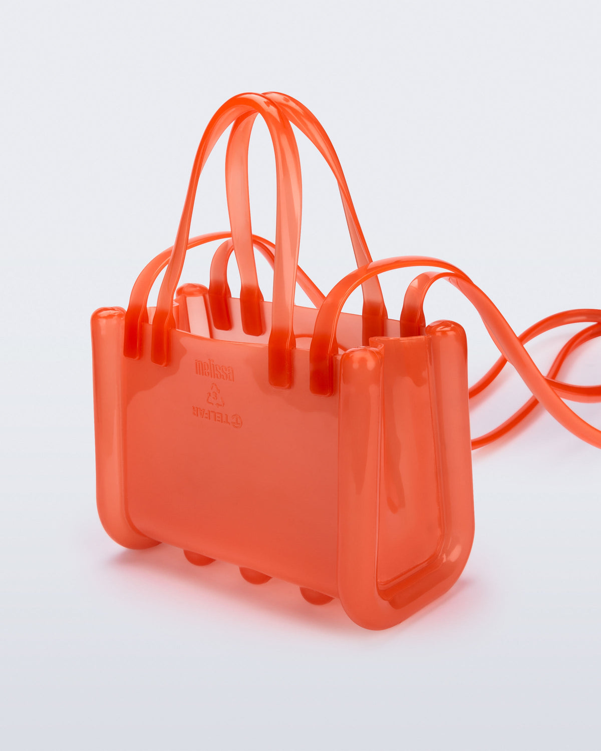 Back view of the orange Small Jelly Shopper x Telfar bag