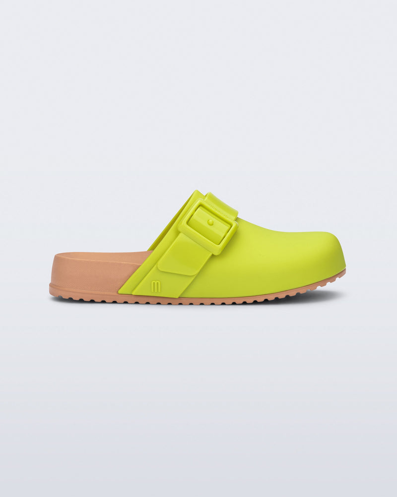 Side view of a green kids Cozy Clog
