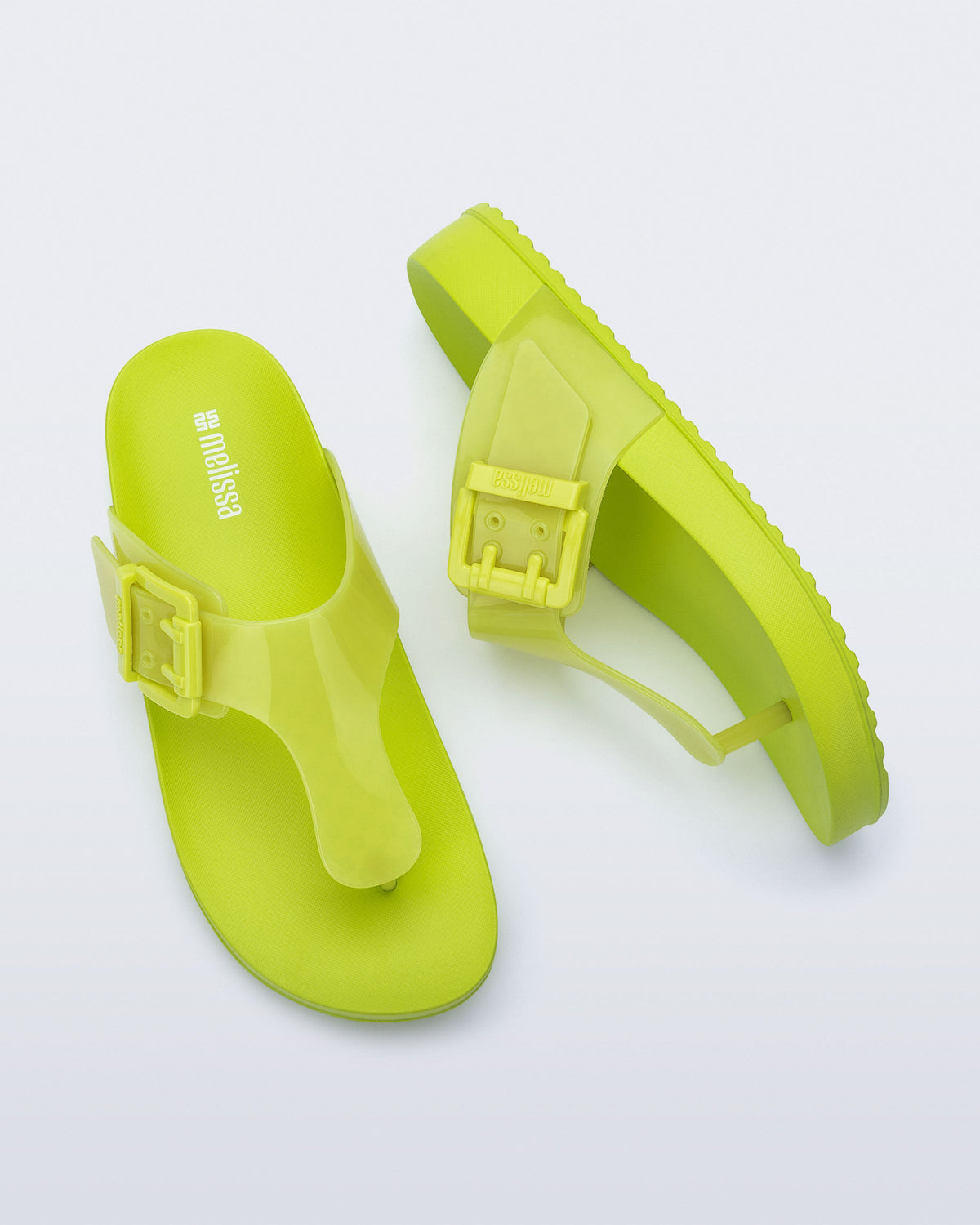 Top and side view of a pair of green Cozy Flip flops