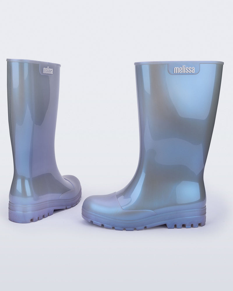Back and side view of a pair of pearly blue Welly rainboots.