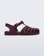 Side view of a matte burgundy Possession fisherman sandal.