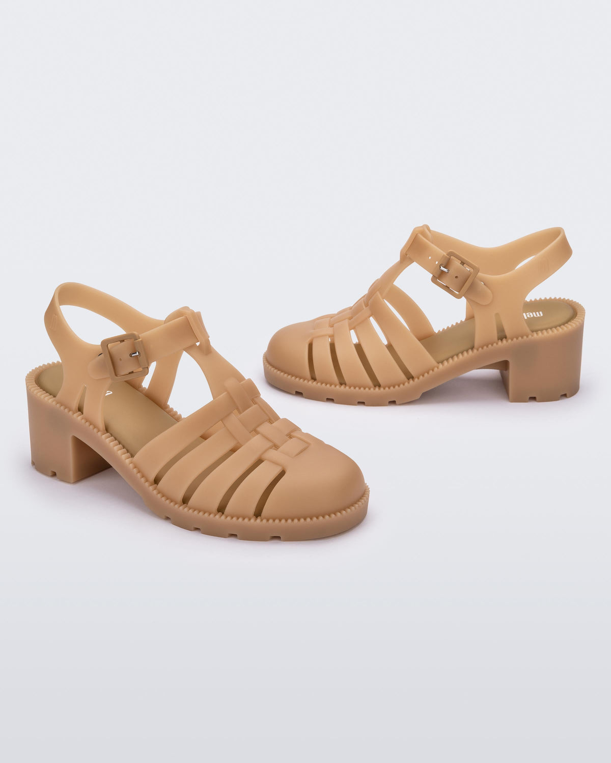 Angled view of a pair of beige Possession Heel women's fisherman style sandals.