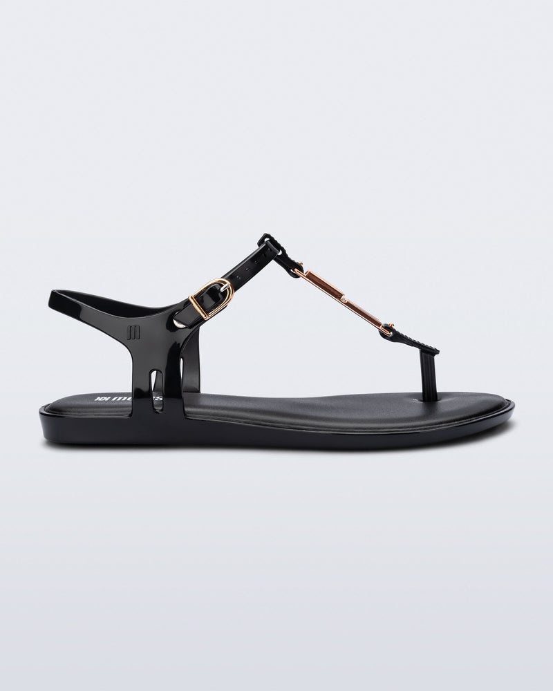 Side view of a black Solar M Chic sandal