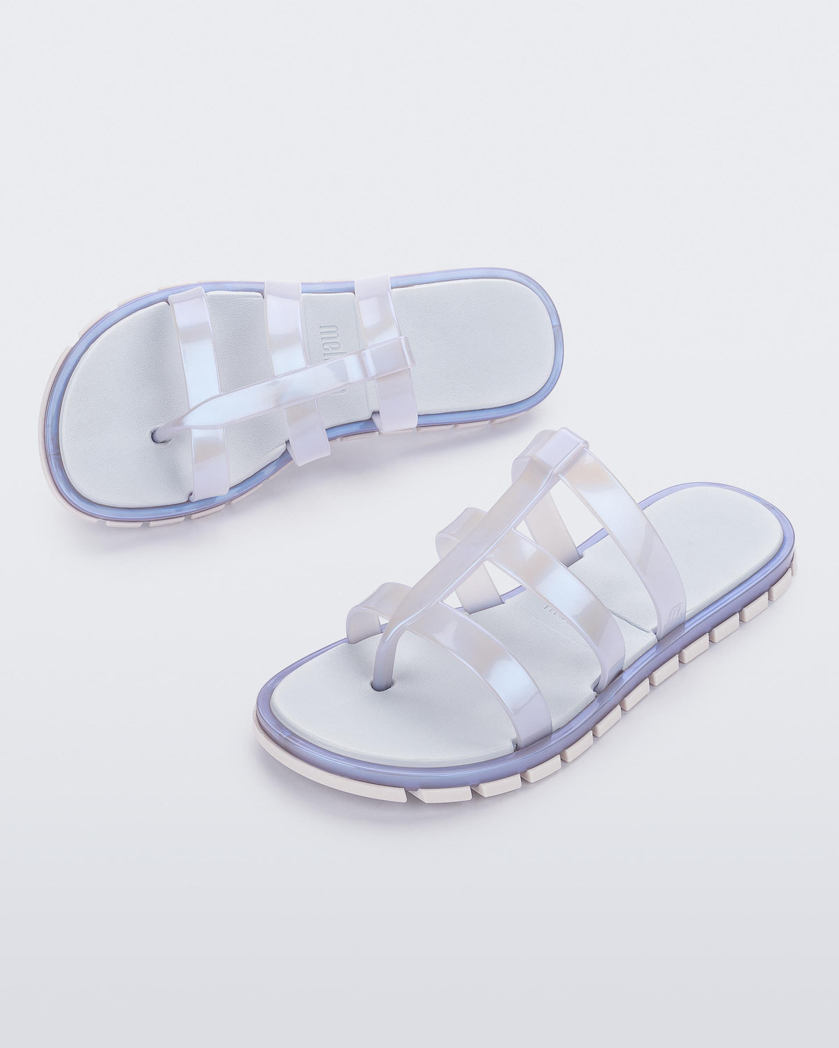Top and angled view of a pair of pearly blue Path adult sandals with blue sole