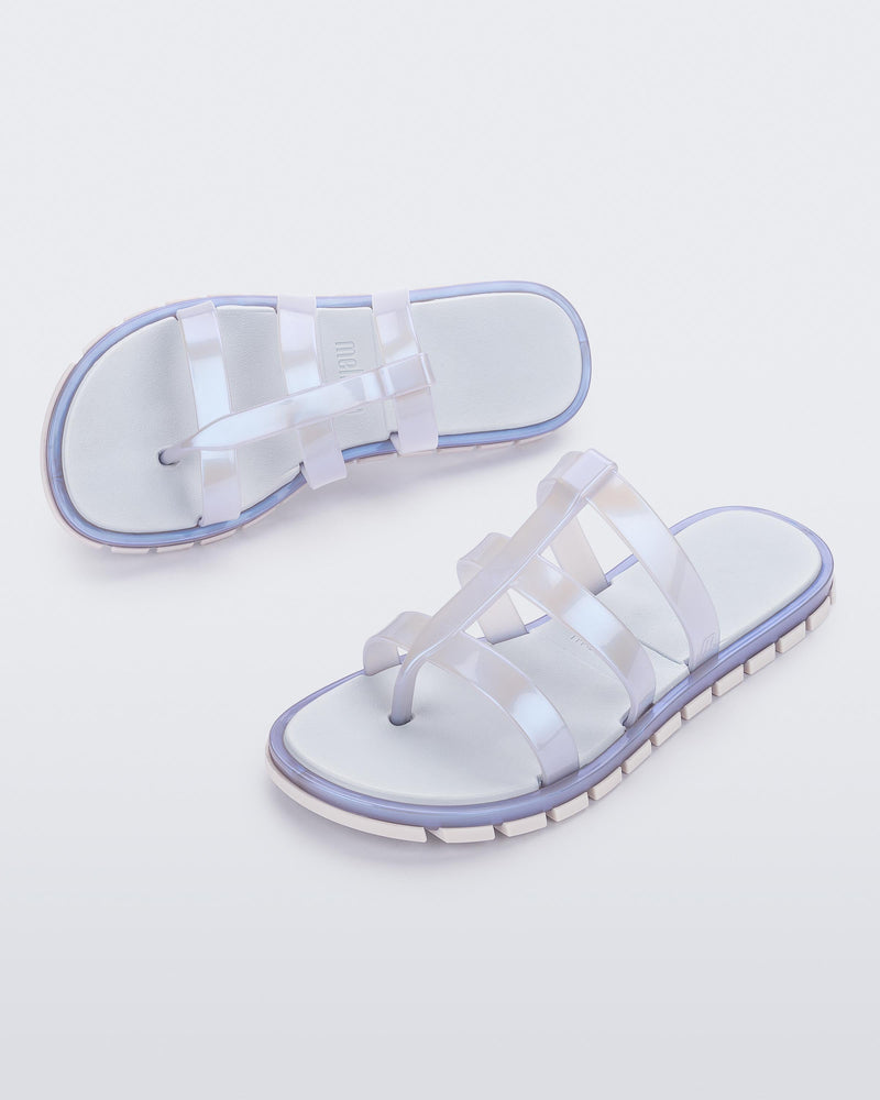Top and angled view of a pair of pearly blue Path adult sandals with blue sole