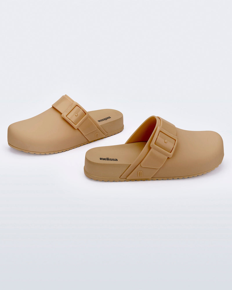 Side and angled view of a dark beige Cozy Clog