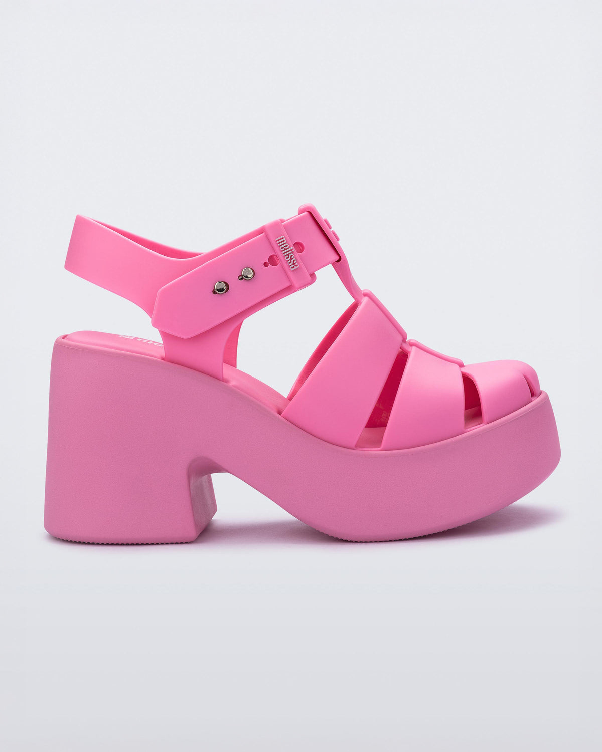 Side view of a matte pink Lulu platform heel sandal