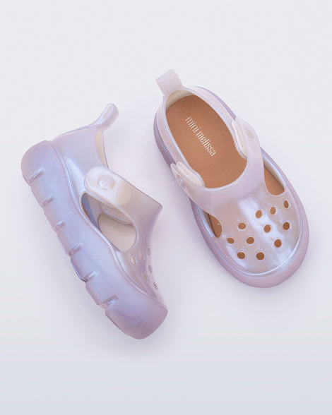 Top and side view of a pair of pearly blue Bowie baby sandals.