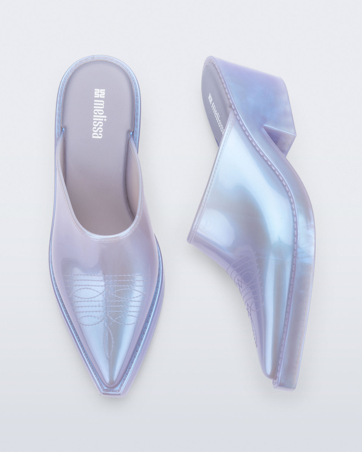 Side and top view of a pair of pearly blue Texas Mule heels